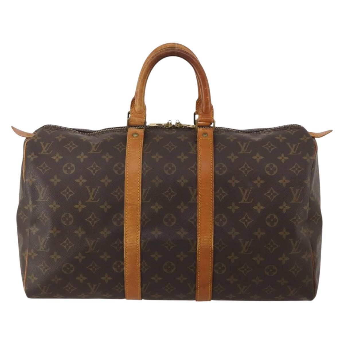 Louis Vuitton Keepall Monogram Brown Canvas Travel Bag Bag (Pre-Owned)