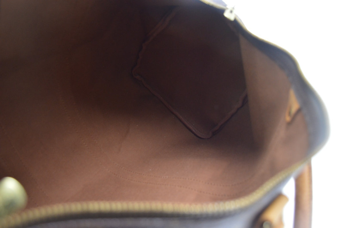 Louis Vuitton Keepall Monogram Canvas Brown Canvas Travel Bag Bag (Pre-Owned)
