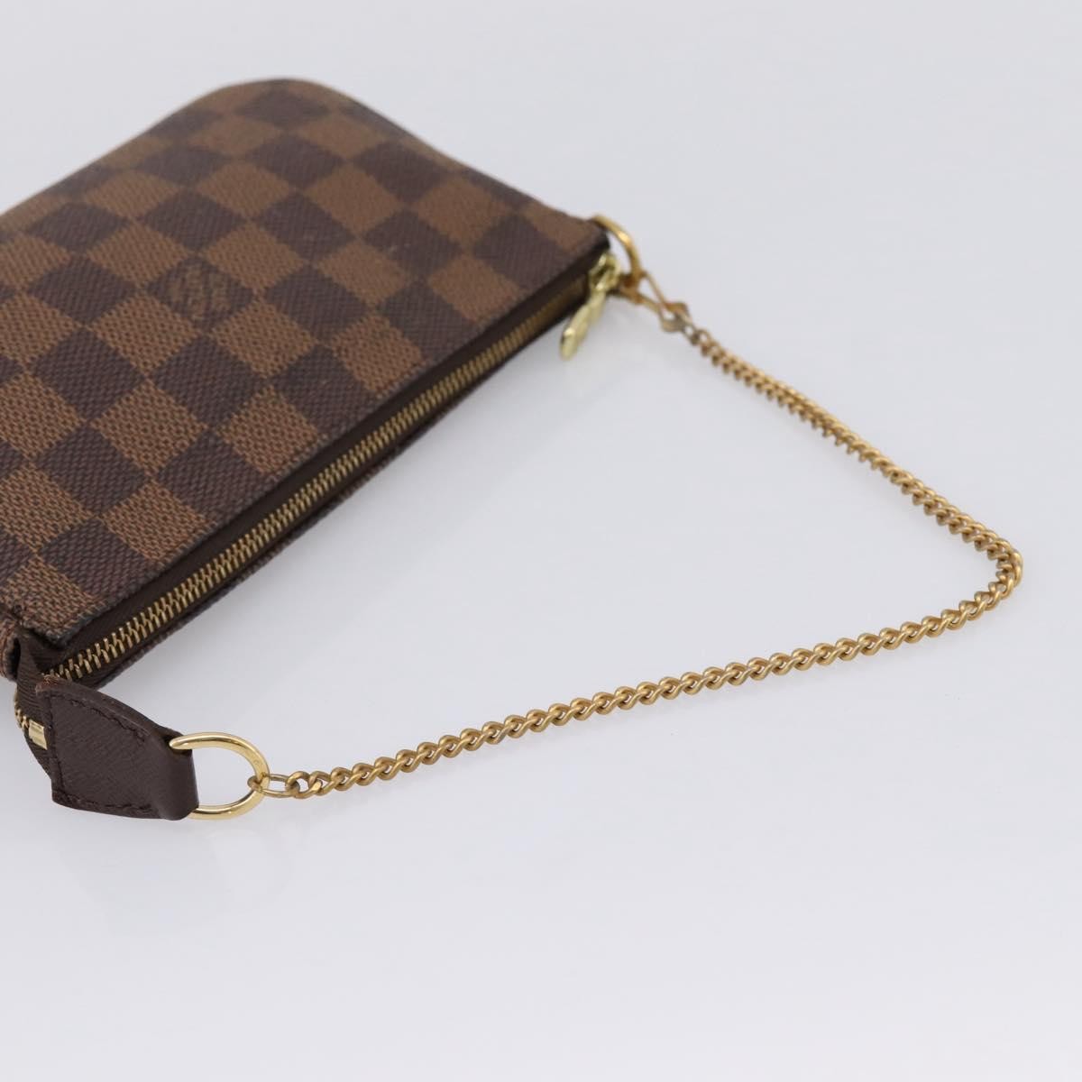 Louis Vuitton Mini Pochette Accessoires Damier Canvas Brown Canvas Clutche & Pouche Bag (Pre-Owned)