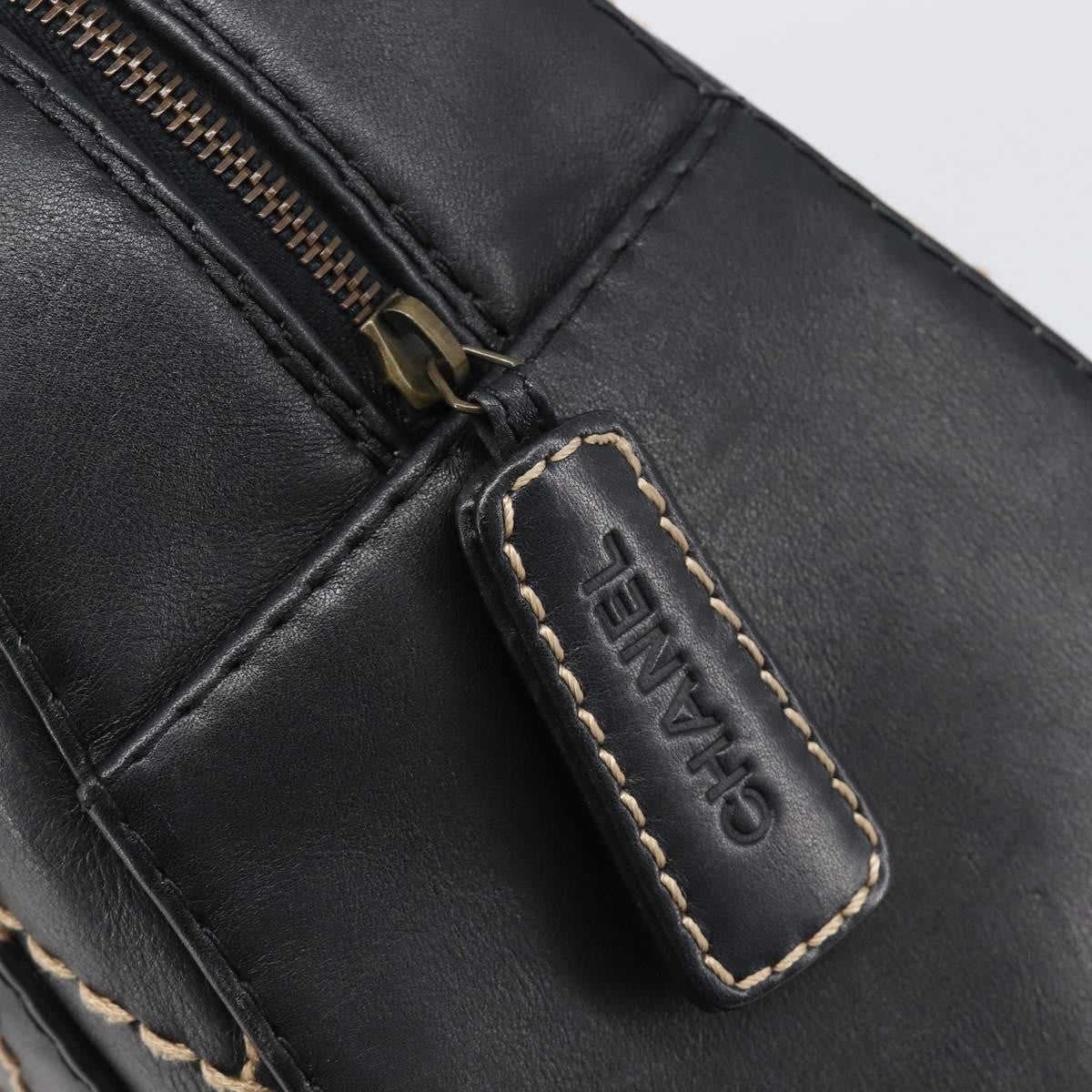 Chanel Surpique Boston Quilted Leather Black Leather Handbag (Pre-Owned)