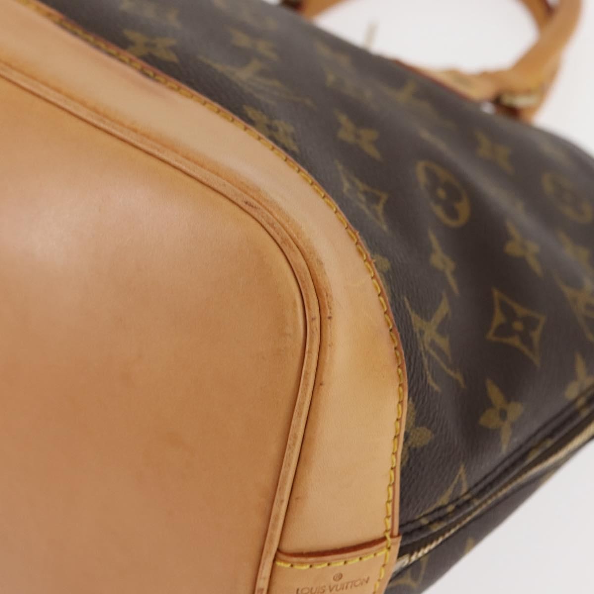 Louis Vuitton Alma Monogram Canvas Brown Canvas Handbag (Pre-Owned)