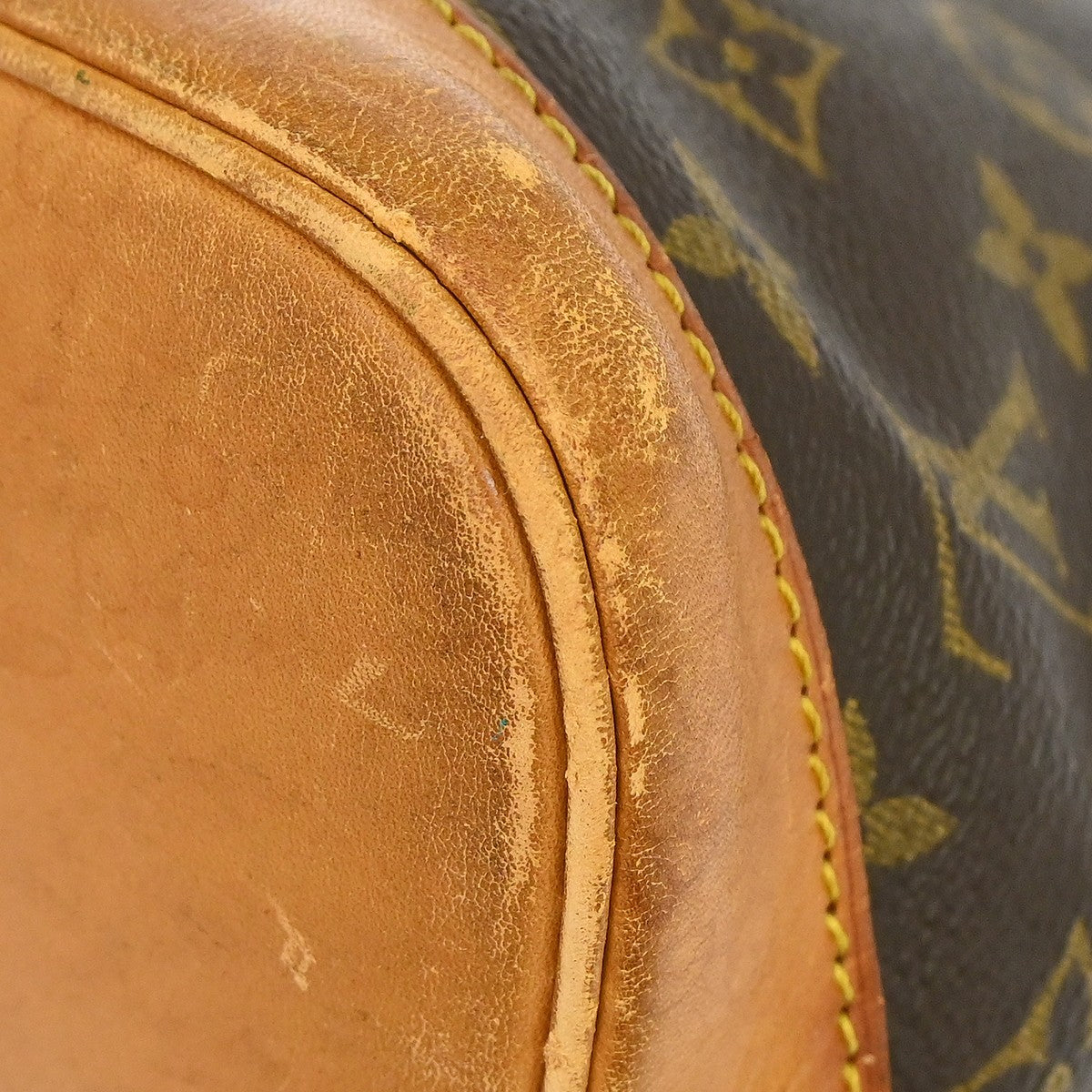 Louis Vuitton Alma Monogram Brown Canvas Handbag (Pre-Owned)