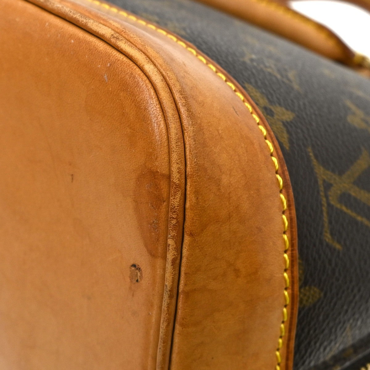 Louis Vuitton Alma Monogram Brown Canvas Handbag (Pre-Owned)