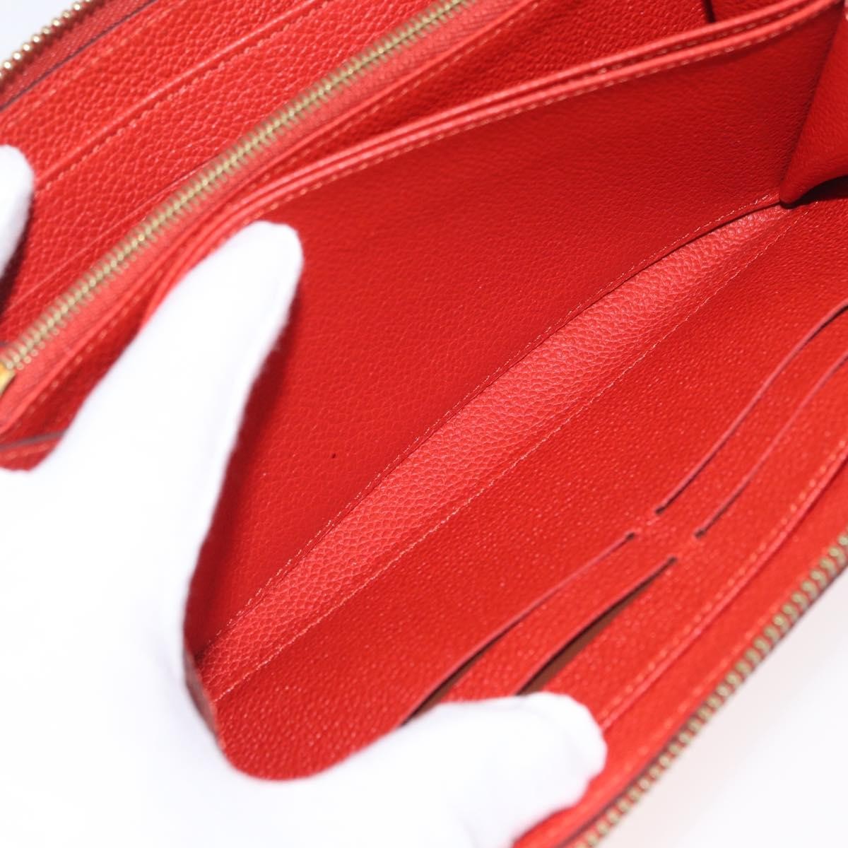 Louis Vuitton Portefeuille Zippy Monogramme Empreinte Monogramme Empreinte Orange Leather Wallets Accessory (Pre-Owned)