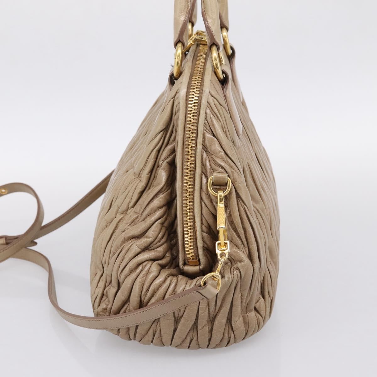 Miu Miu Convertible Dome Satchel Matelasse Leather Beige Leather Handbag (Pre-Owned)