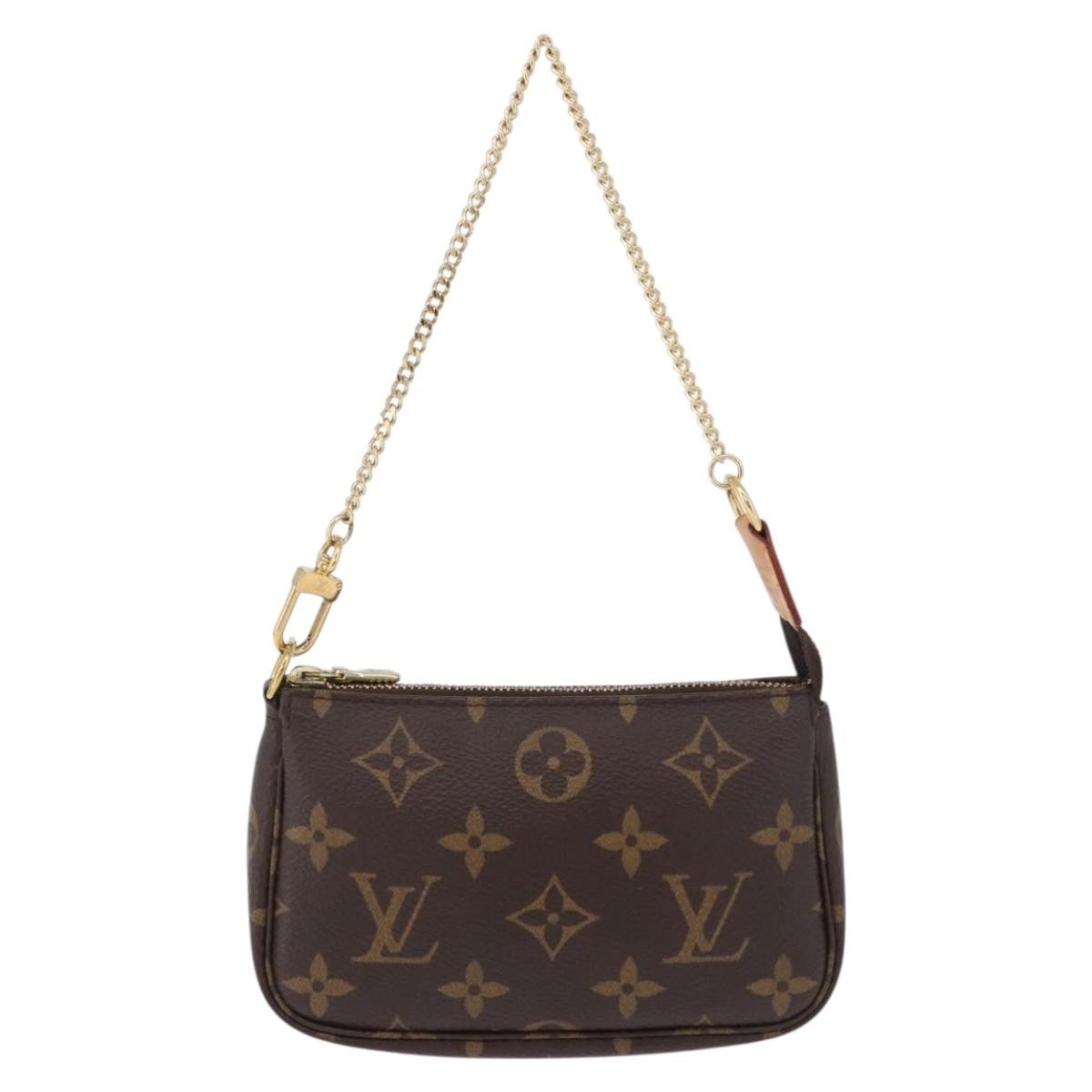 Louis Vuitton Mini Pochette Accessoires Canvas Brown Canvas Clutche & Pouche Bag (Pre-Owned)