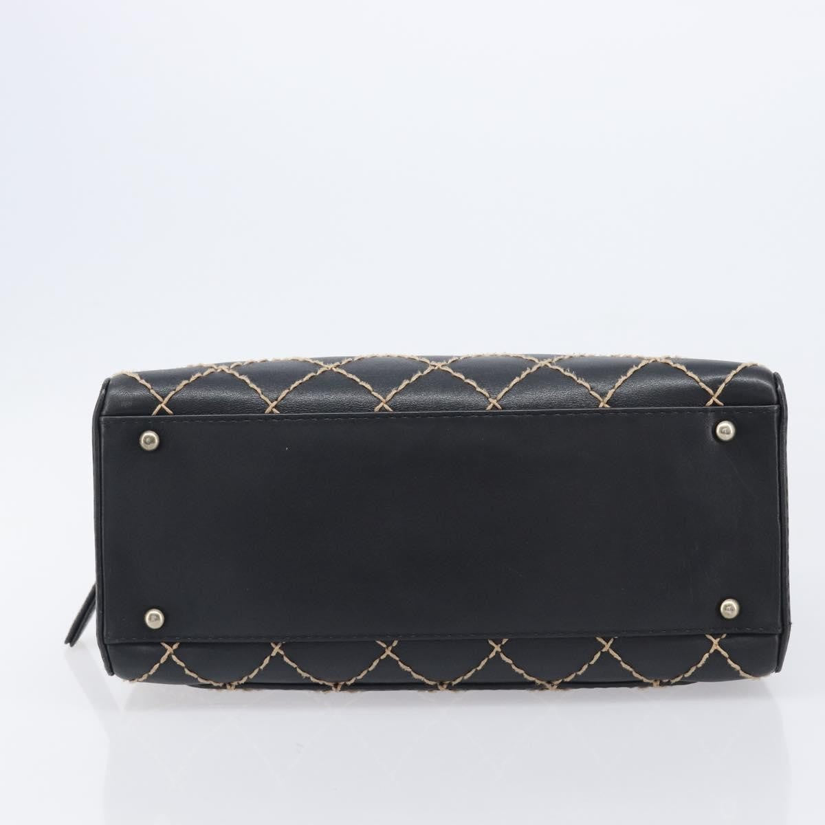 Chanel Surpique Boston Quilted Leather Black Leather Handbag (Pre-Owned)