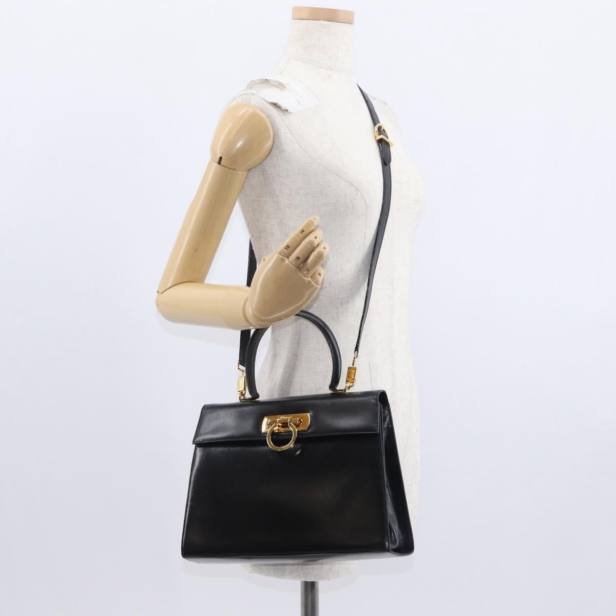 Salvatore Ferragamo Convertible Top Handle Leather Black Leather Handbag (Pre-Owned)