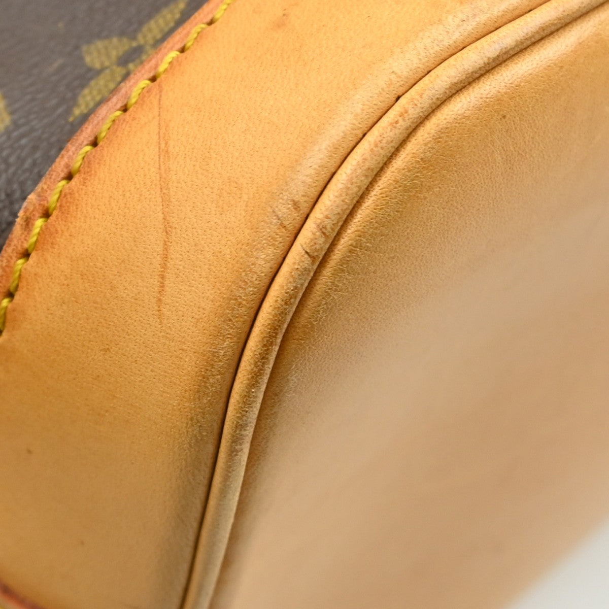 Louis Vuitton Alma Monogram Brown Canvas Handbag (Pre-Owned)