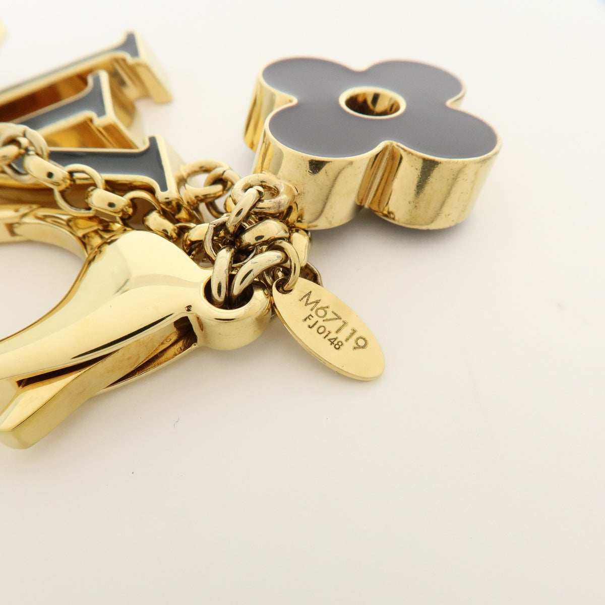 Louis Vuitton Fleur De Monogram Bag Charm Metal Gold Metal Charms And Keychains Accessory (Pre-Owned)