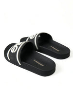Dolce & Gabbana Chic Logo-Embossed Black Slides for Elegant Women's Comfort
