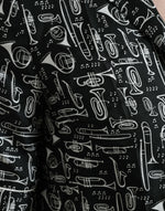 Dolce & Gabbana Elegant Silk Polo T-Shirt with Trumpet Men's Print