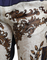 Dolce & Gabbana Elegant Silk Skinny Pants with Heraldic Men's Print