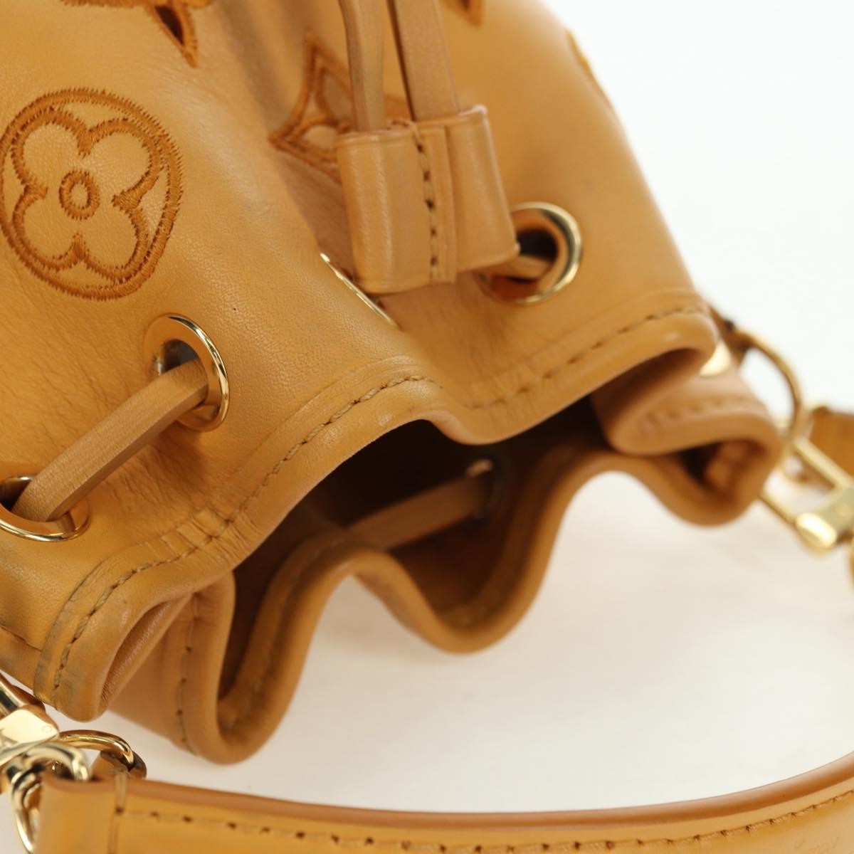 Louis Vuitton Noe Nm Perforated And Embroidered Monogram Leather Yellow Leather Shoulder Bag Bag (Pre-Owned)