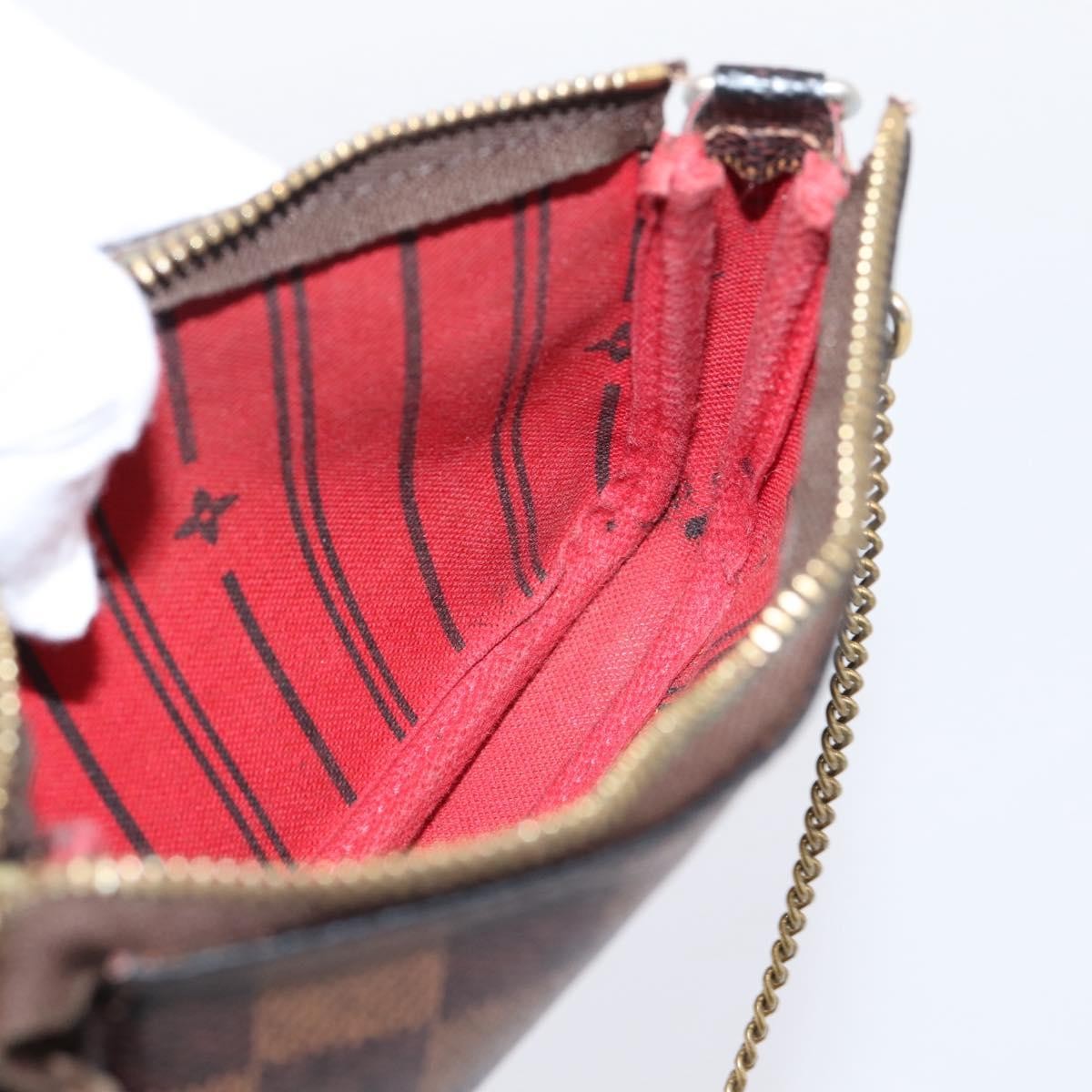 Louis Vuitton Mini Pochette Accessoires Damier Canvas Brown Canvas Clutche & Pouche Bag (Pre-Owned)