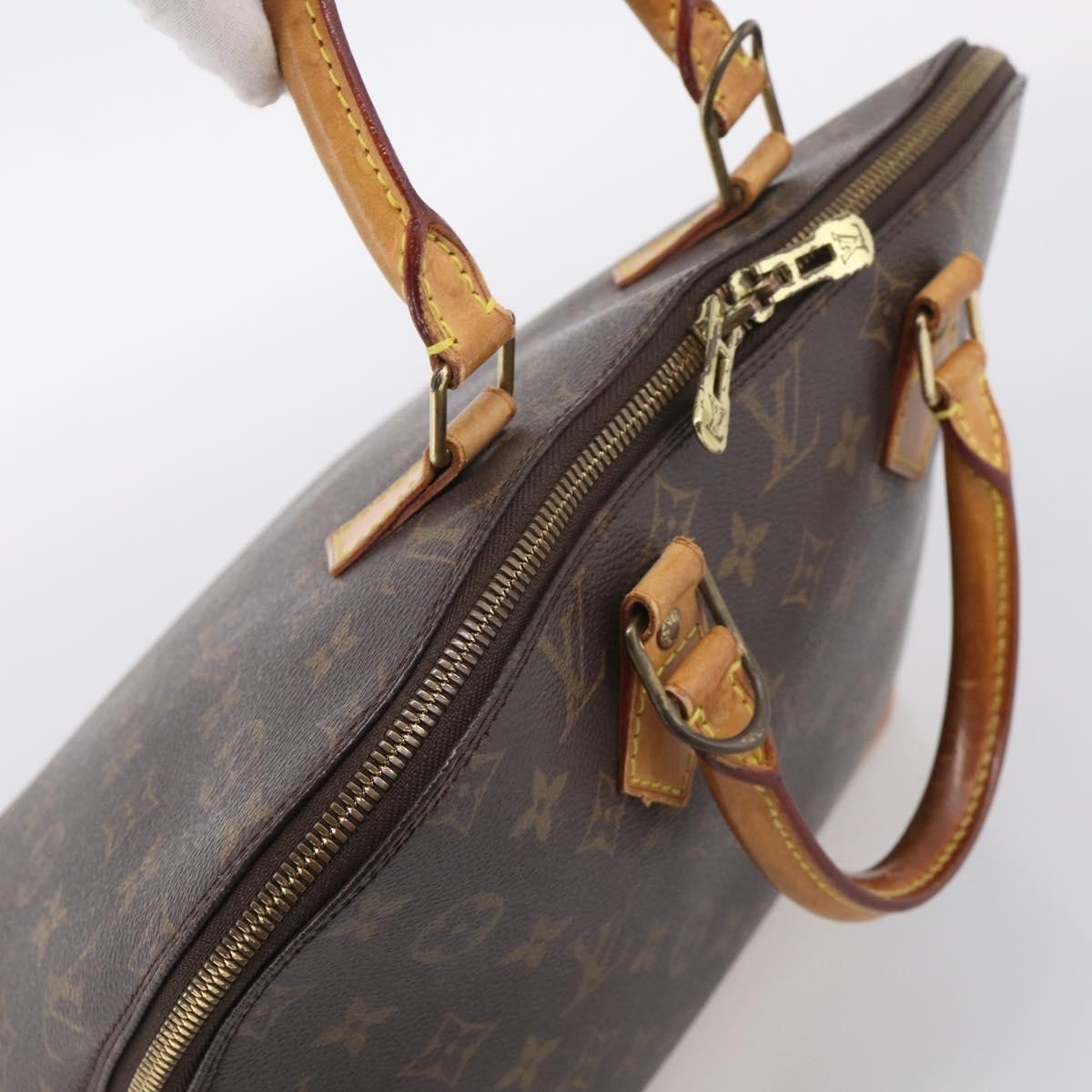 Louis Vuitton Alma Monogram Canvas Brown Canvas Handbag (Pre-Owned)