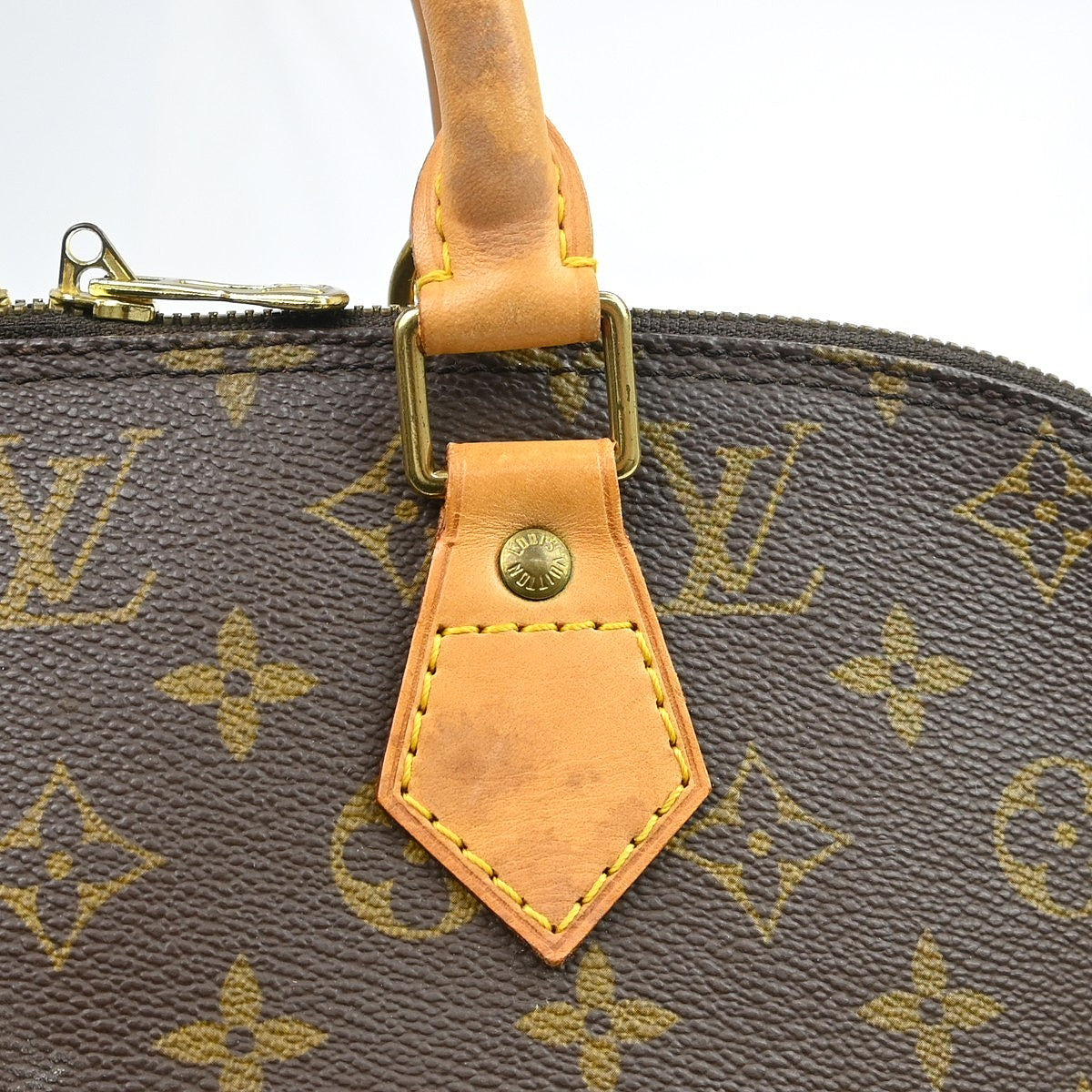 Louis Vuitton Alma Monogram Brown Canvas Handbag (Pre-Owned)