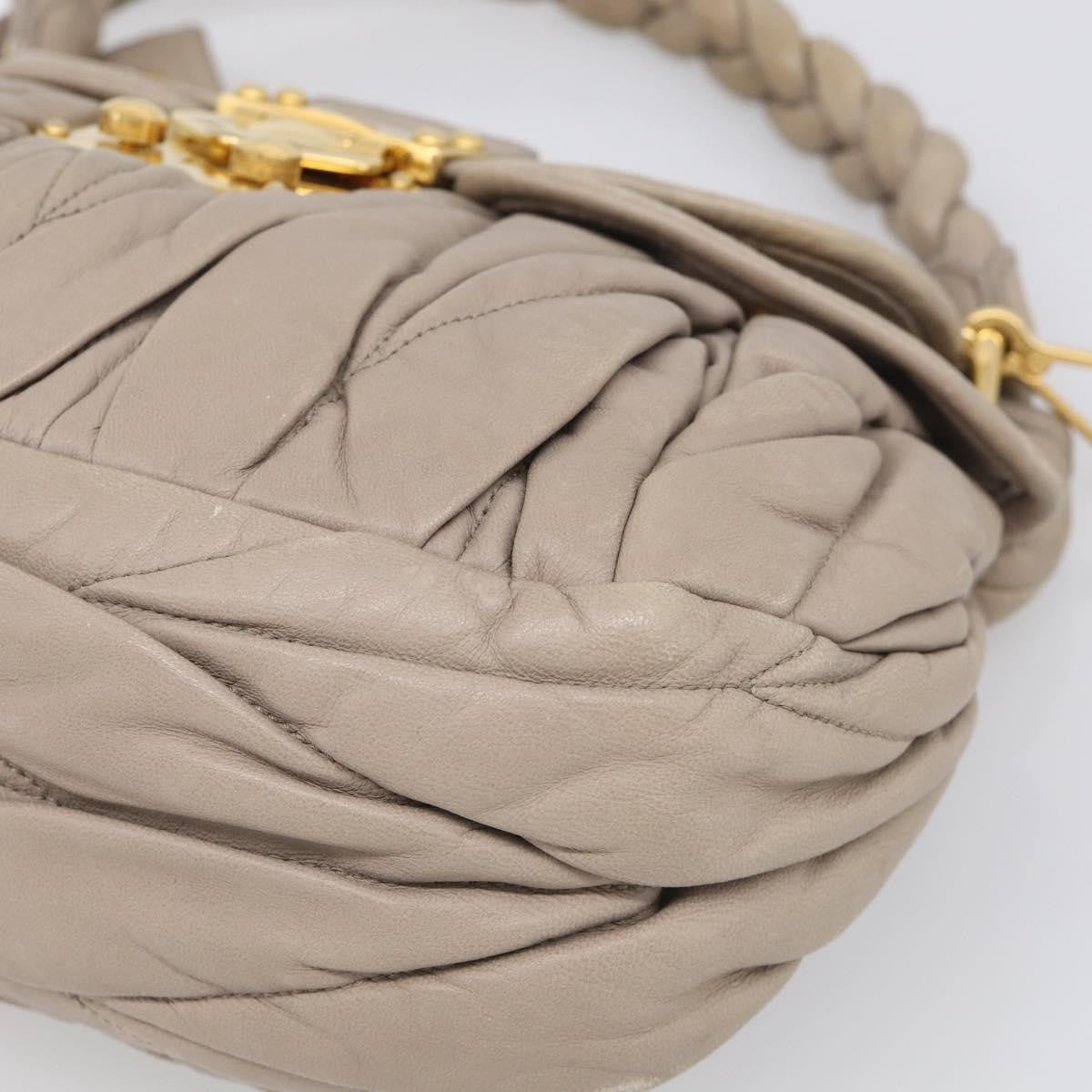 Miu Miu Coffer Hobo Matelasse Leather Beige Leather Handbag (Pre-Owned)