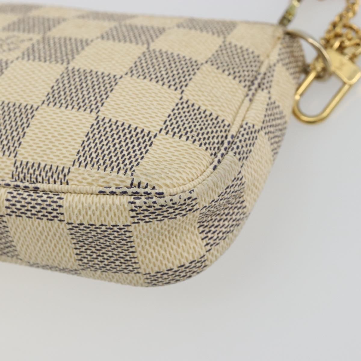 Louis Vuitton Mini Pochette Accessoires Damier Canvas Beige Canvas Clutche & Pouche Bag (Pre-Owned)
