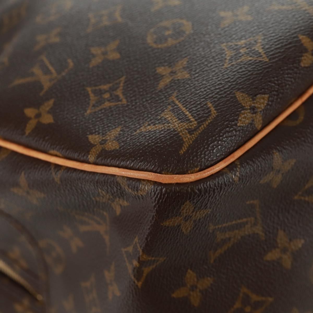 Louis Vuitton Evasion Monogram Canvas Brown Canvas Travel Bag Bag (Pre-Owned)