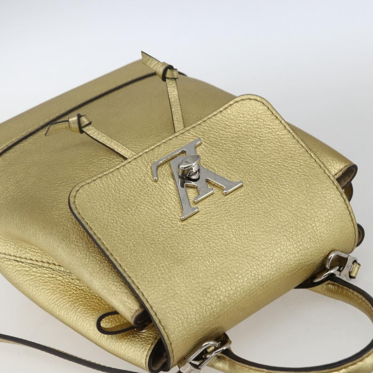 Louis Vuitton Lockme Leather Gold Leather Backpack Bag (Pre-Owned)
