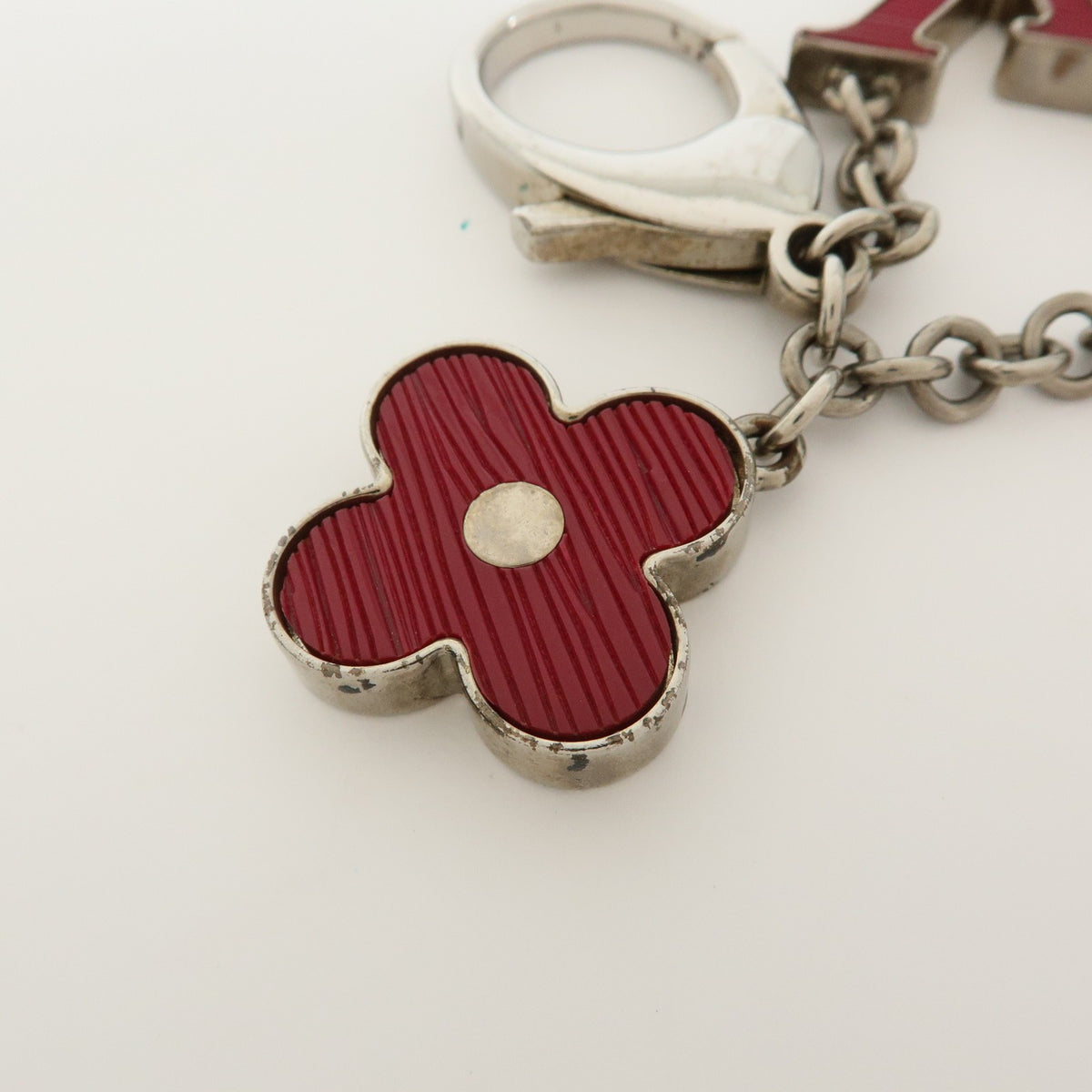 Louis Vuitton Fleur D'epi Bag Charm Resin And Brass Burgundy Metal Charms And Keychains Accessory (Pre-Owned)