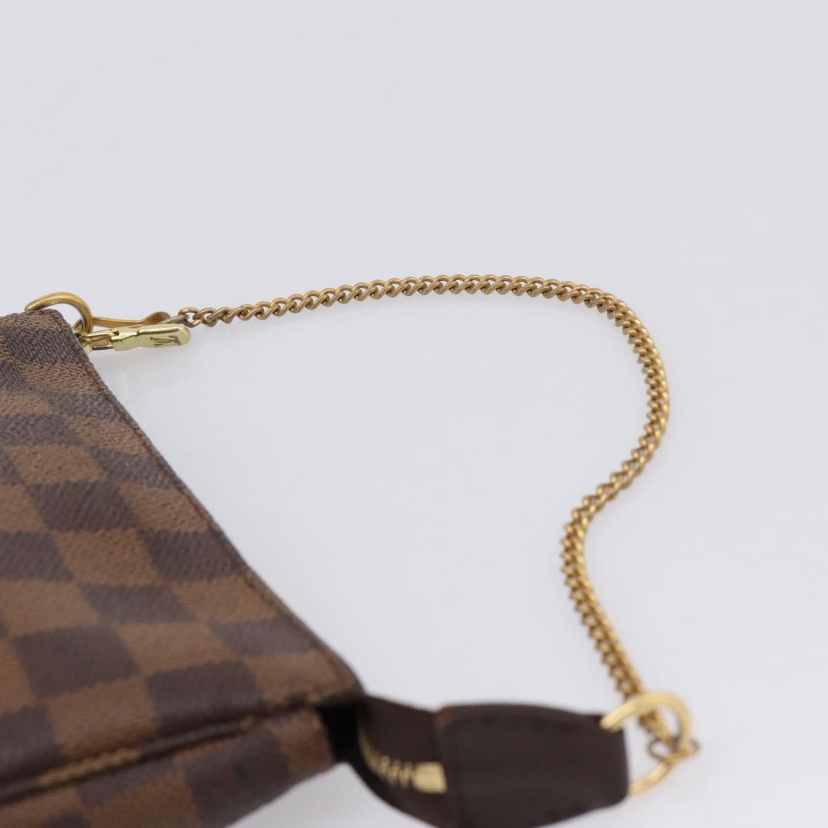 Louis Vuitton Mini Pochette Accessoires Damier Canvas Brown Canvas Clutche & Pouche Bag (Pre-Owned)