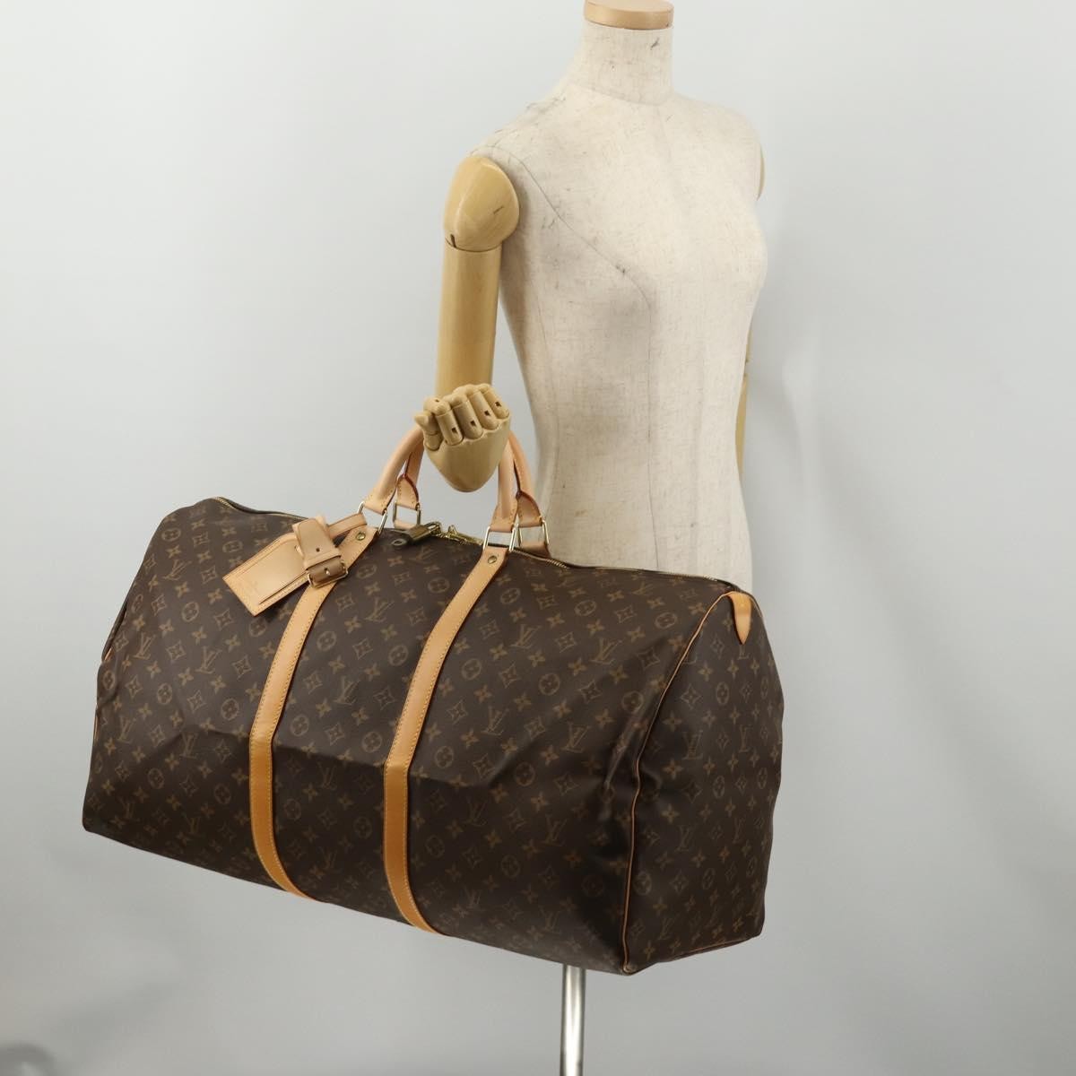 Louis Vuitton Keepall Monogram Canvas Brown Canvas Travel Bag Bag (Pre-Owned)