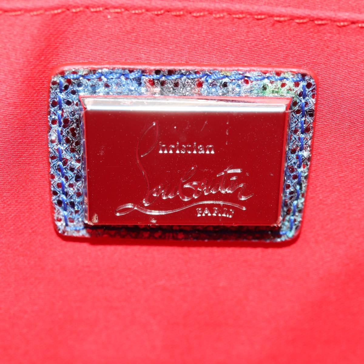 Christian Louboutin Loubiclutch Spiked Printed Leather Red Canvas Shoulder Bag Bag (Pre-Owned)