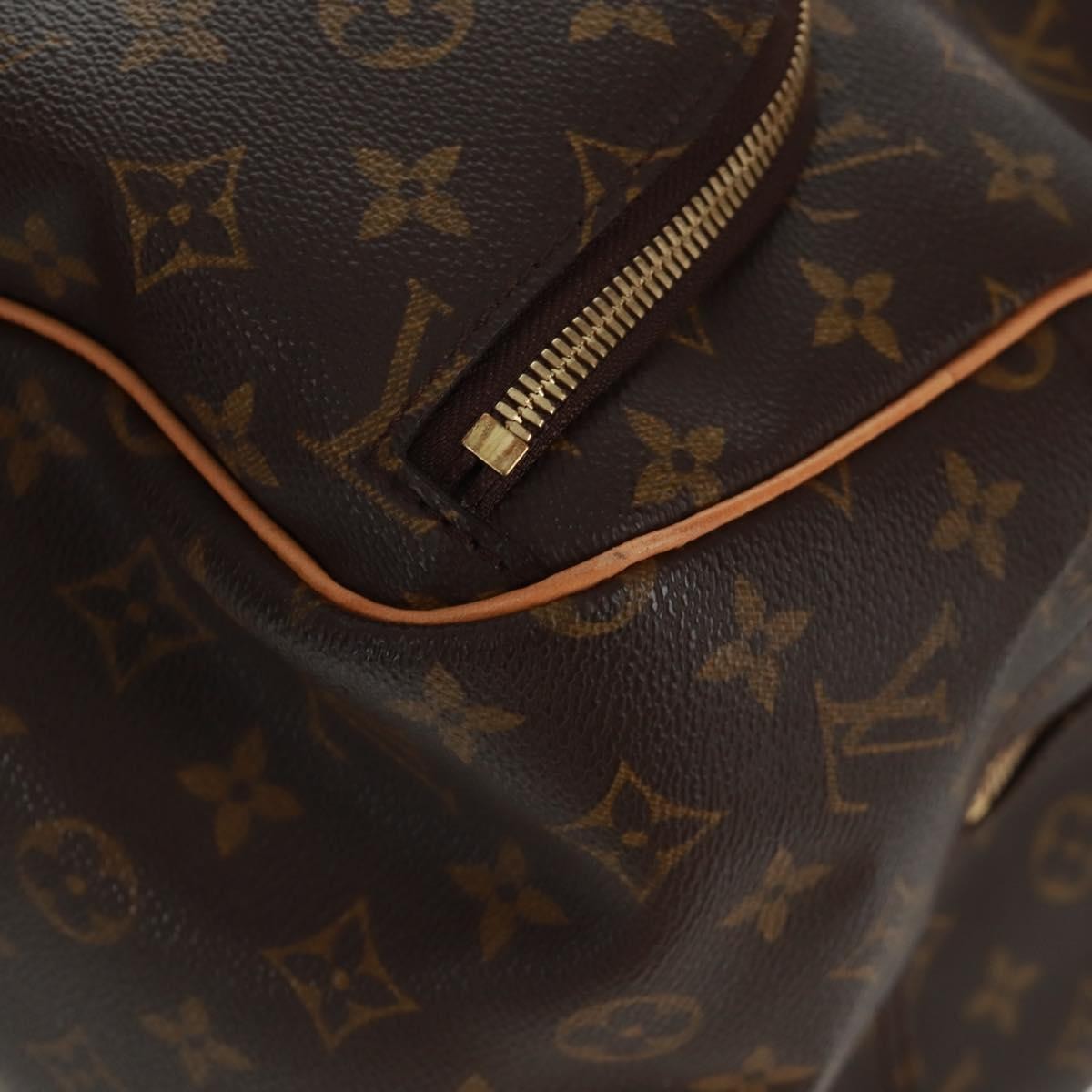 Louis Vuitton Evasion Monogram Canvas Brown Canvas Travel Bag Bag (Pre-Owned)