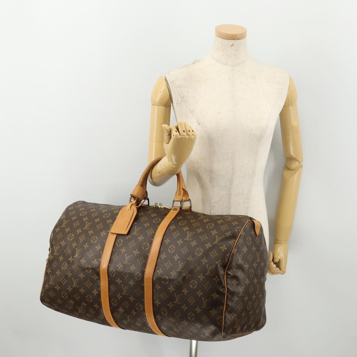 Louis Vuitton Keepall Monogram Canvas Brown Canvas Travel Bag Bag (Pre-Owned)
