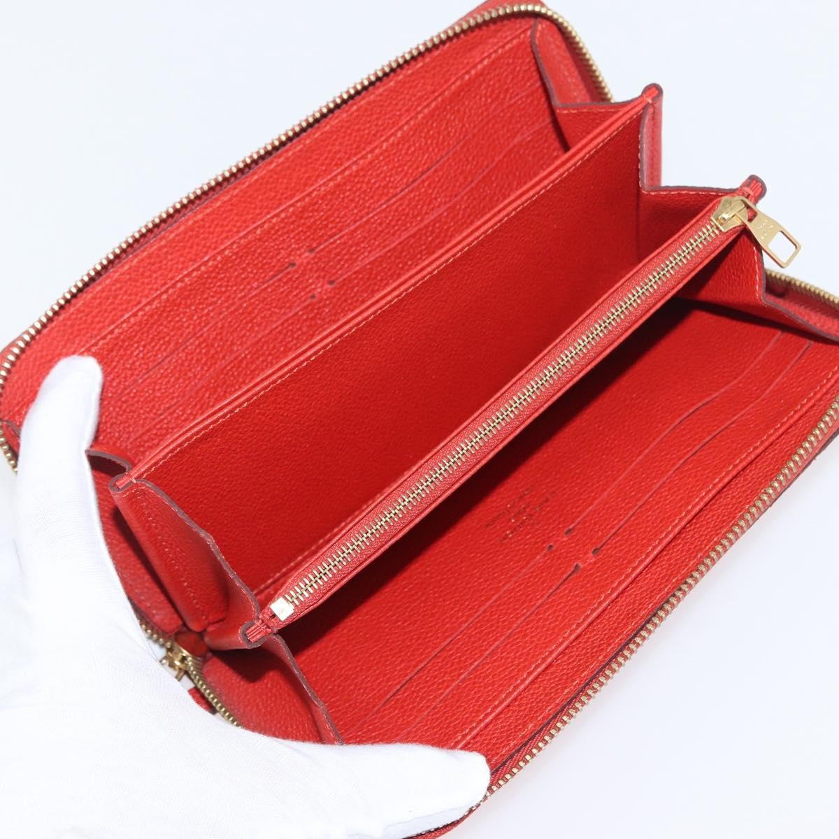 Louis Vuitton Portefeuille Zippy Monogramme Empreinte Monogramme Empreinte Orange Leather Wallets Accessory (Pre-Owned)