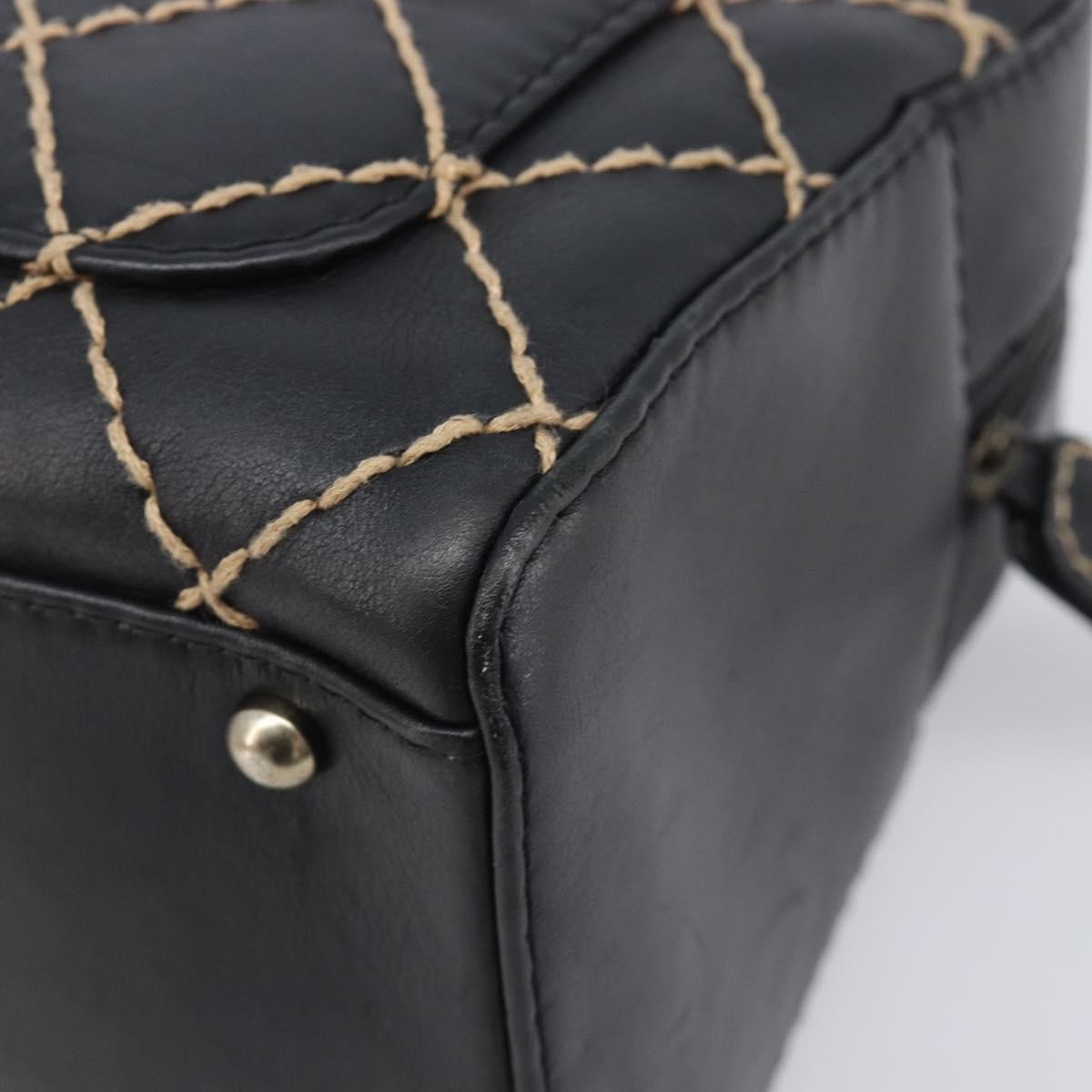 Chanel Surpique Boston Quilted Leather Black Leather Handbag (Pre-Owned)