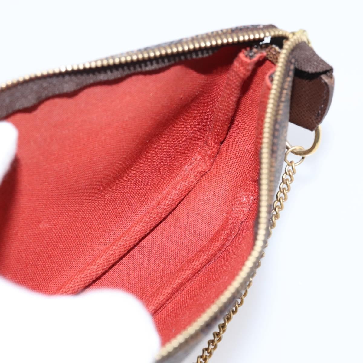 Louis Vuitton Mini Pochette Accessoires Damier Canvas Brown Canvas Clutche & Pouche Bag (Pre-Owned)