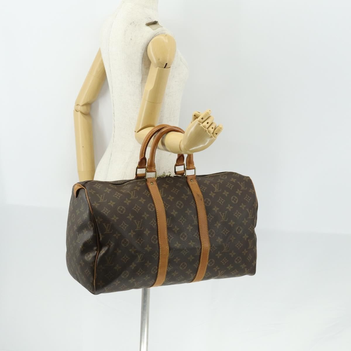 Louis Vuitton Keepall Monogram Canvas Brown Canvas Travel Bag Bag (Pre-Owned)