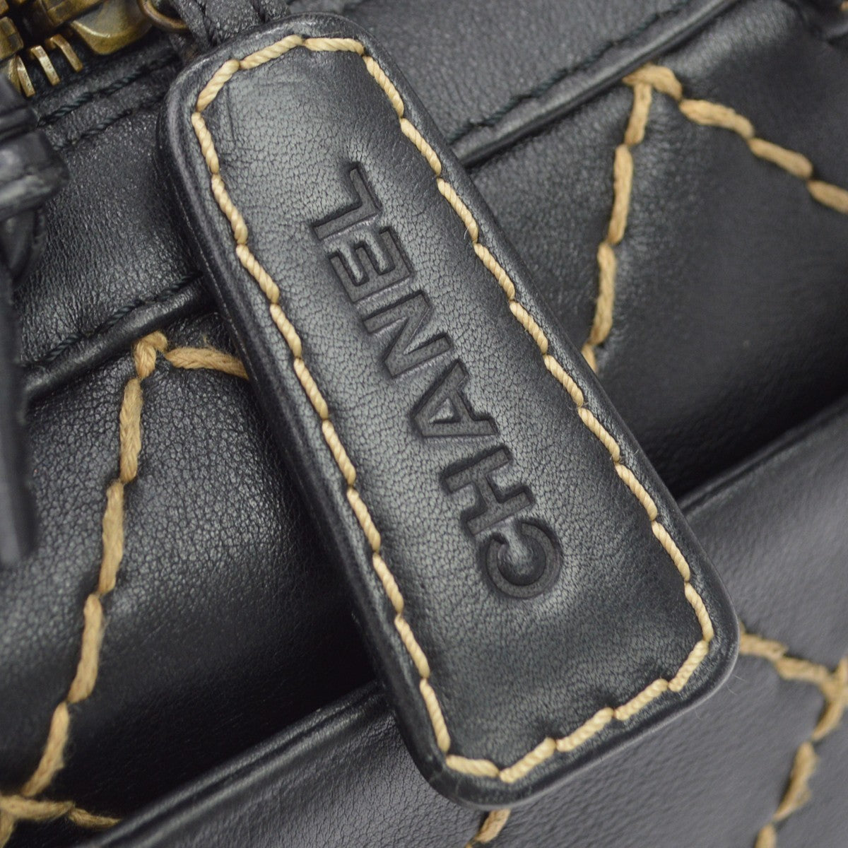 Chanel Surpique Zip Around Satchel Quilted Leather Black Leather Handbag (Pre-Owned)