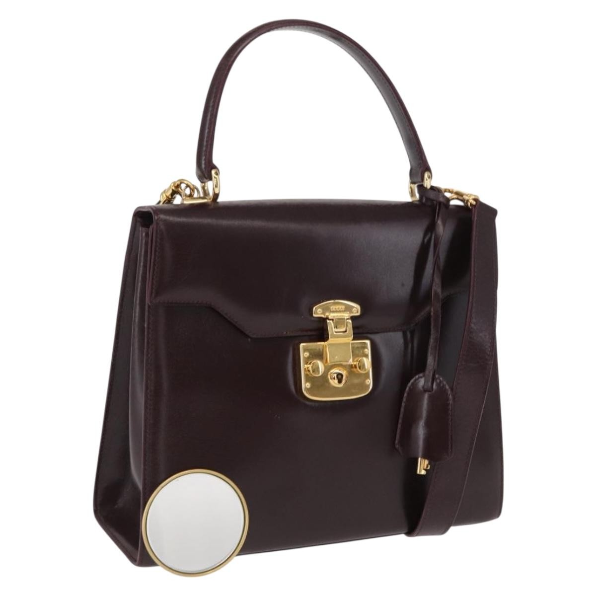 Gucci Vintage Lady Lock Top Handle Leather Burgundy Leather Handbag (Pre-Owned)