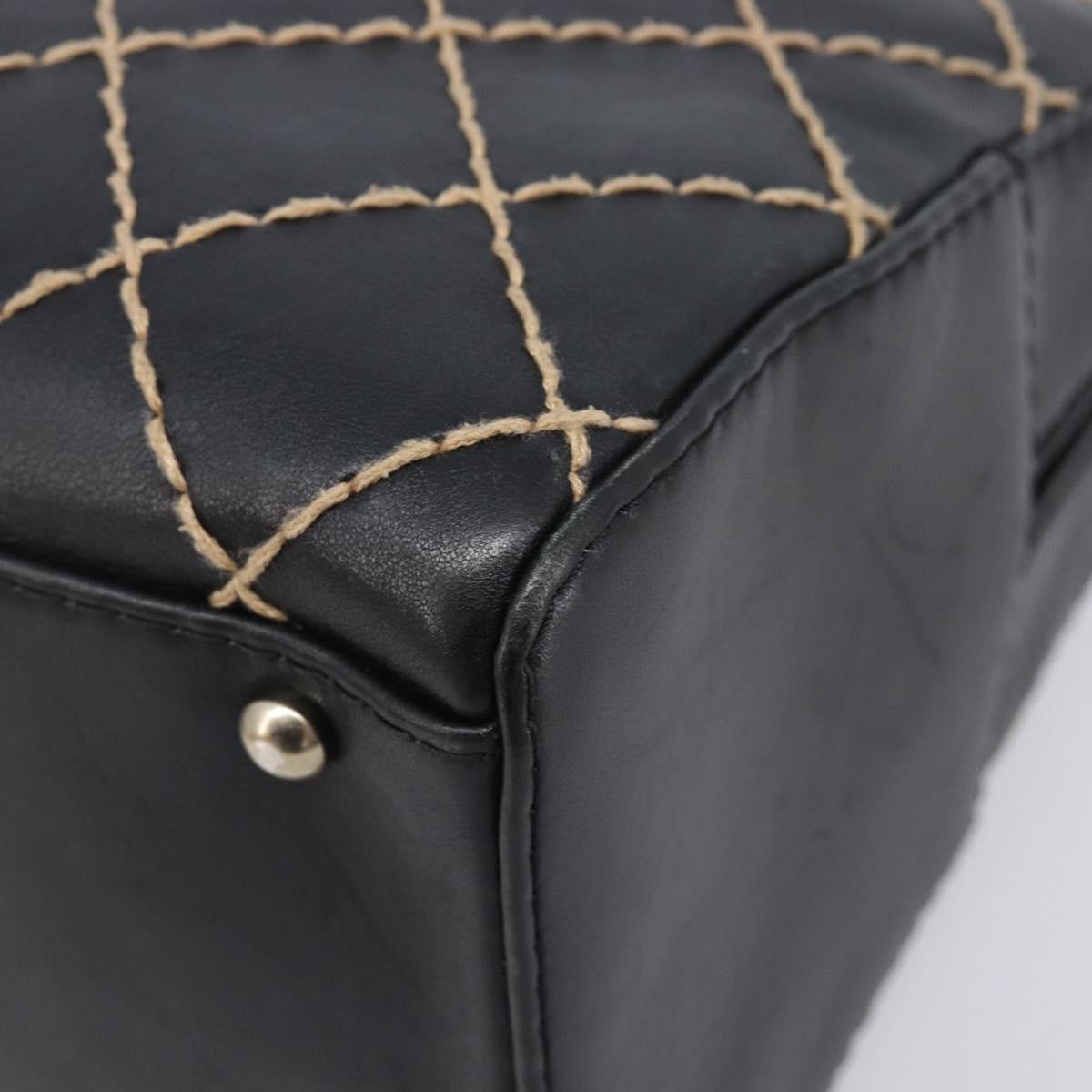 Chanel Surpique Boston Quilted Leather Black Leather Handbag (Pre-Owned)