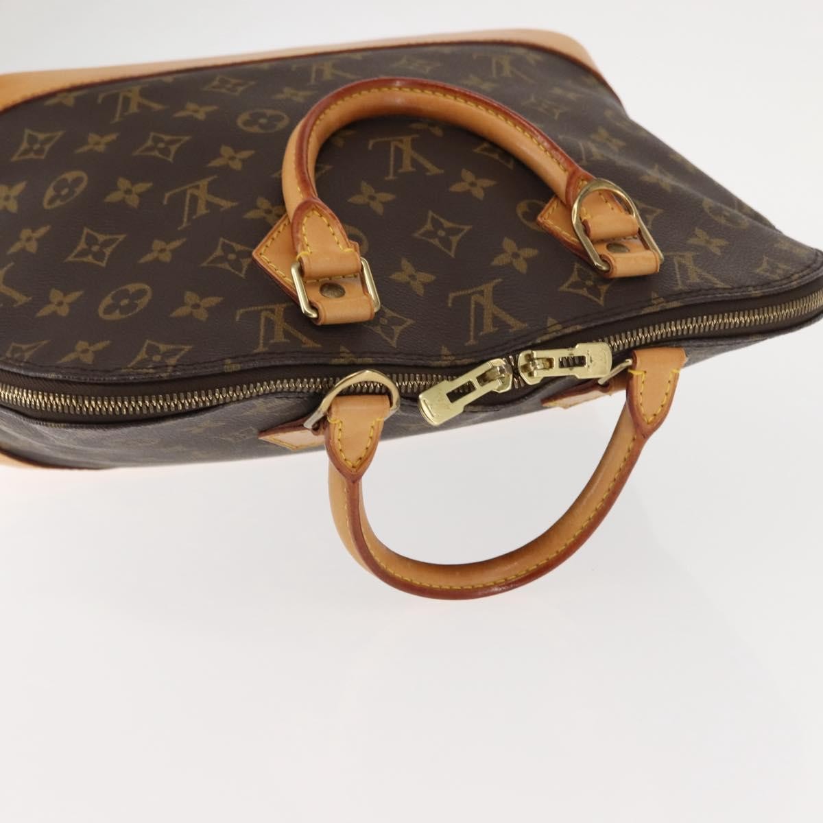 Louis Vuitton Alma Monogram Canvas Brown Canvas Handbag (Pre-Owned)