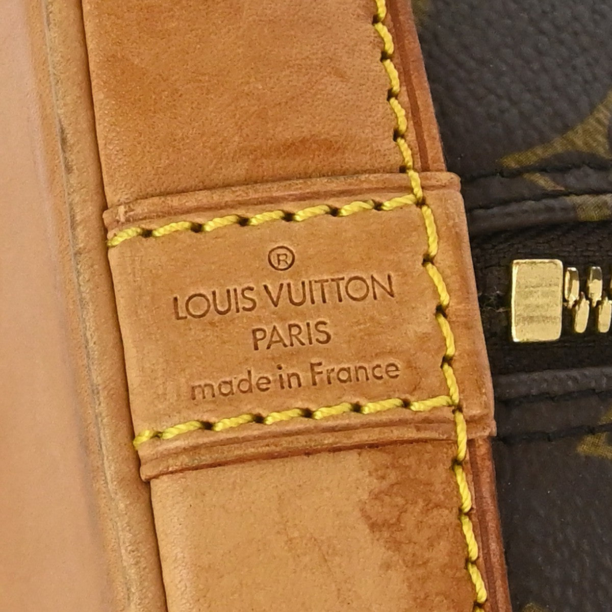Louis Vuitton Alma Monogram Brown Canvas Handbag (Pre-Owned)