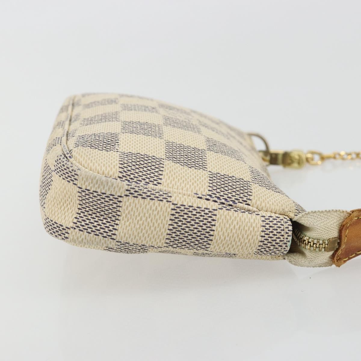 Louis Vuitton Mini Pochette Accessoires Damier Canvas Beige Canvas Clutche & Pouche Bag (Pre-Owned)