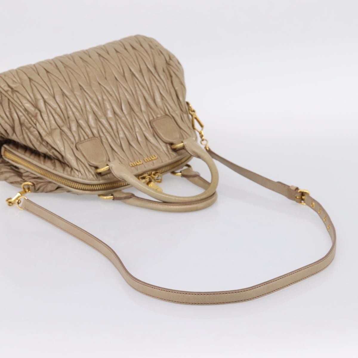 Miu Miu Convertible Dome Satchel Matelasse Leather Beige Leather Handbag (Pre-Owned)