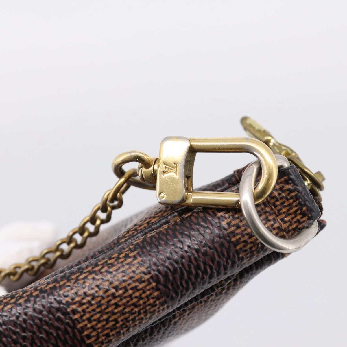 Louis Vuitton Mini Pochette Accessoires Damier Canvas Brown Canvas Clutche & Pouche Bag (Pre-Owned)