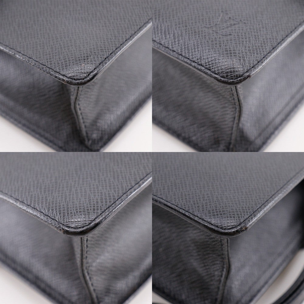 Louis Vuitton Selenga Pochette Taiga Leather Black Leather Clutche & Pouche Bag (Pre-Owned)