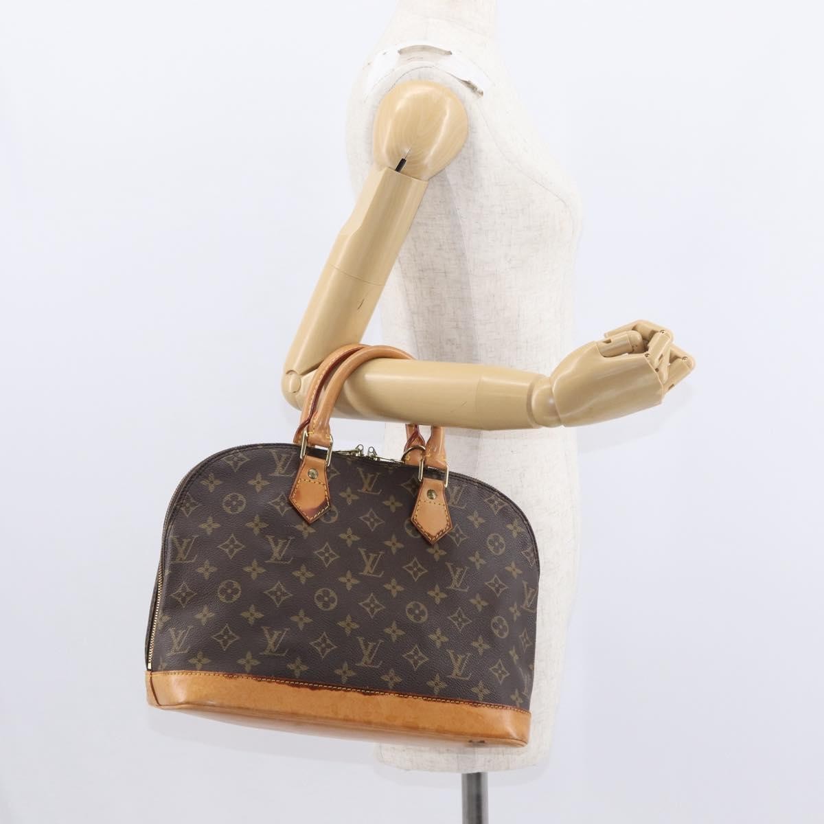 Louis Vuitton Alma Monogram Canvas Brown Canvas Handbag (Pre-Owned)