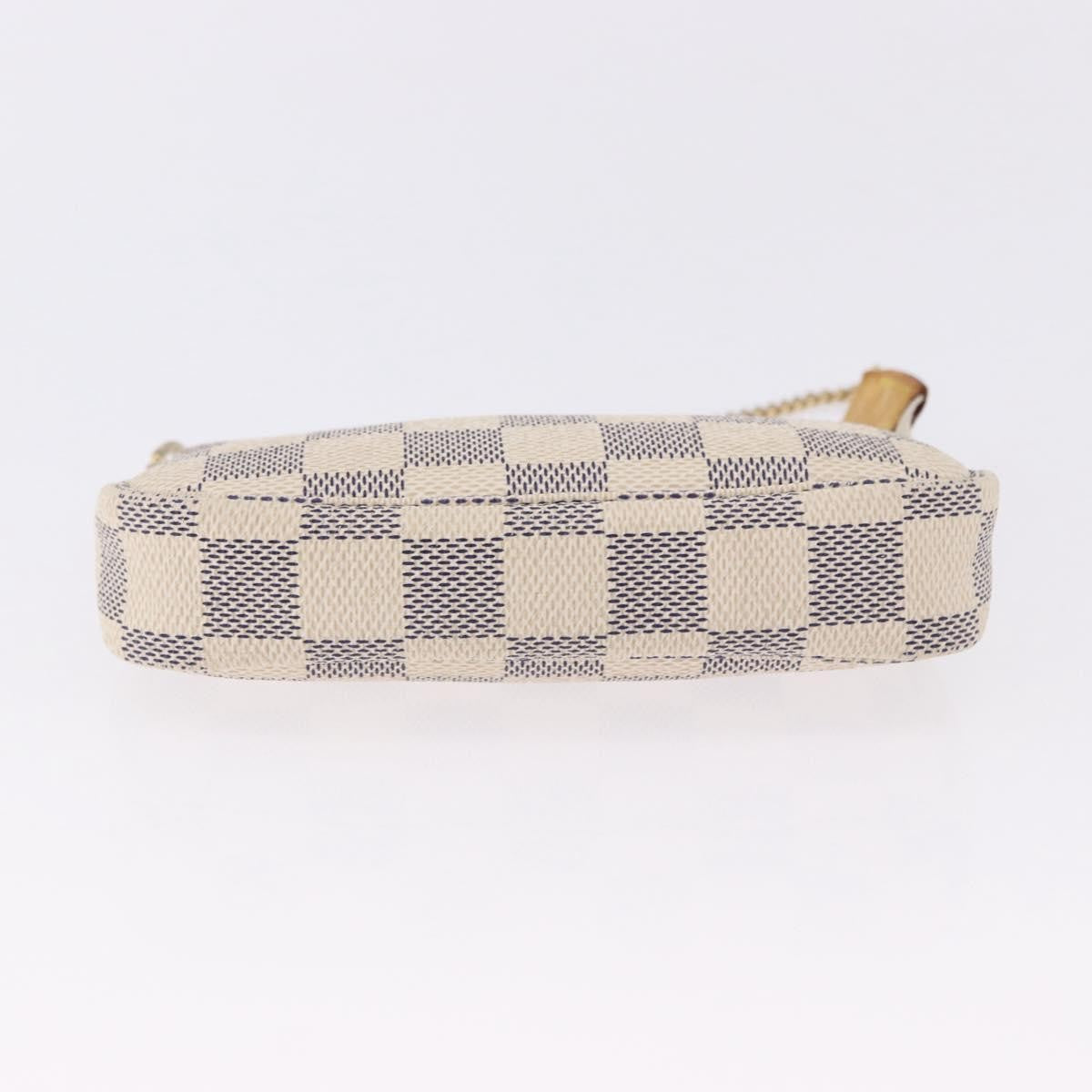 Louis Vuitton Mini Pochette Accessoires Damier Canvas Beige Canvas Clutche & Pouche Bag (Pre-Owned)
