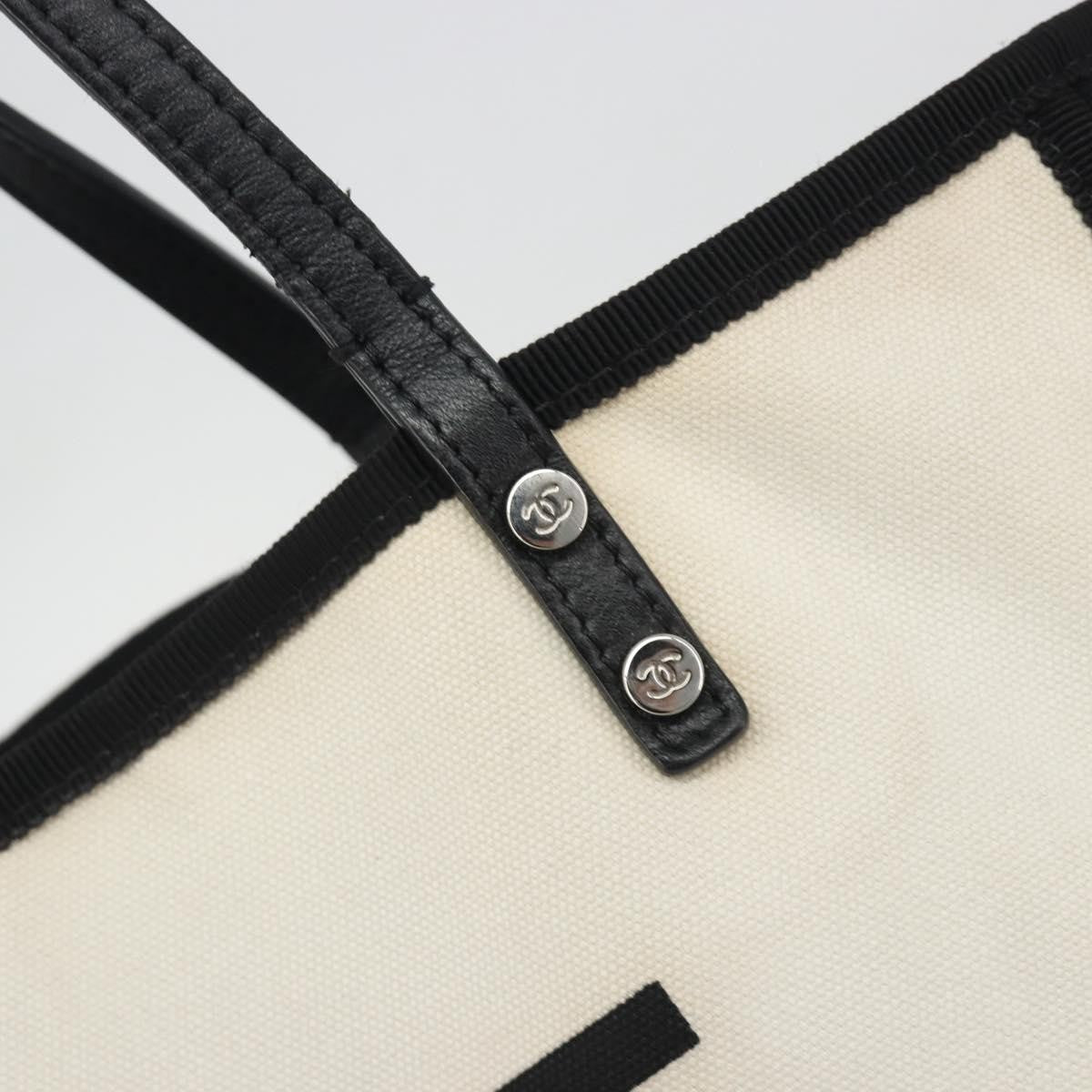 Chanel Let's Demonstrate Canvas Beige Canvas Tote Bag Bag (Pre-Owned)