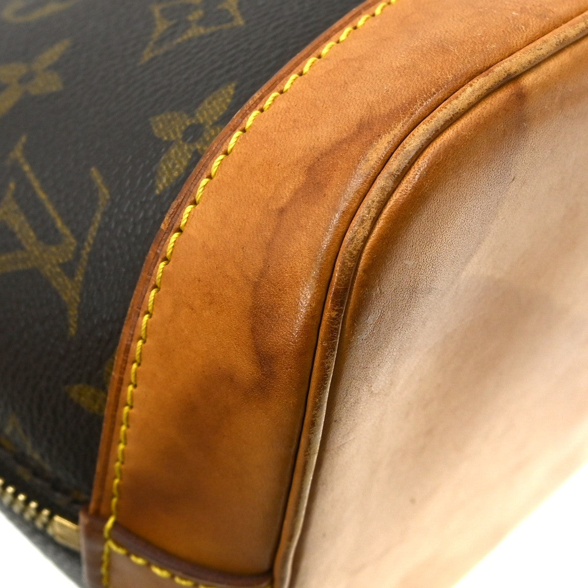 Louis Vuitton Alma Monogram Brown Canvas Handbag (Pre-Owned)