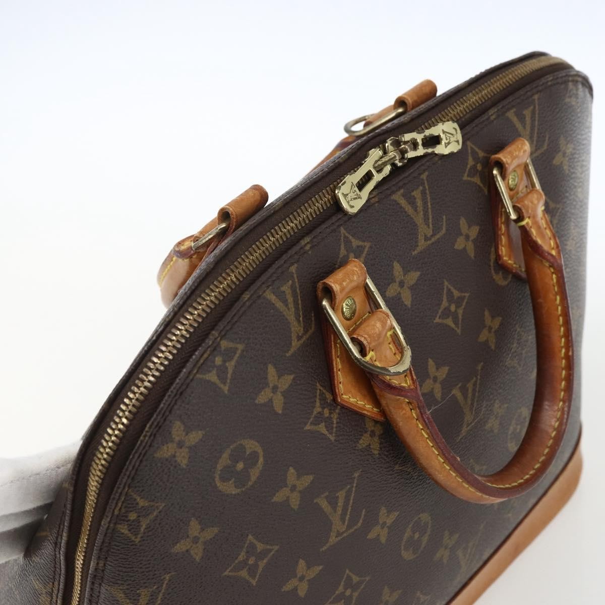 Louis Vuitton Alma Monogram Canvas Brown Canvas Handbag (Pre-Owned)