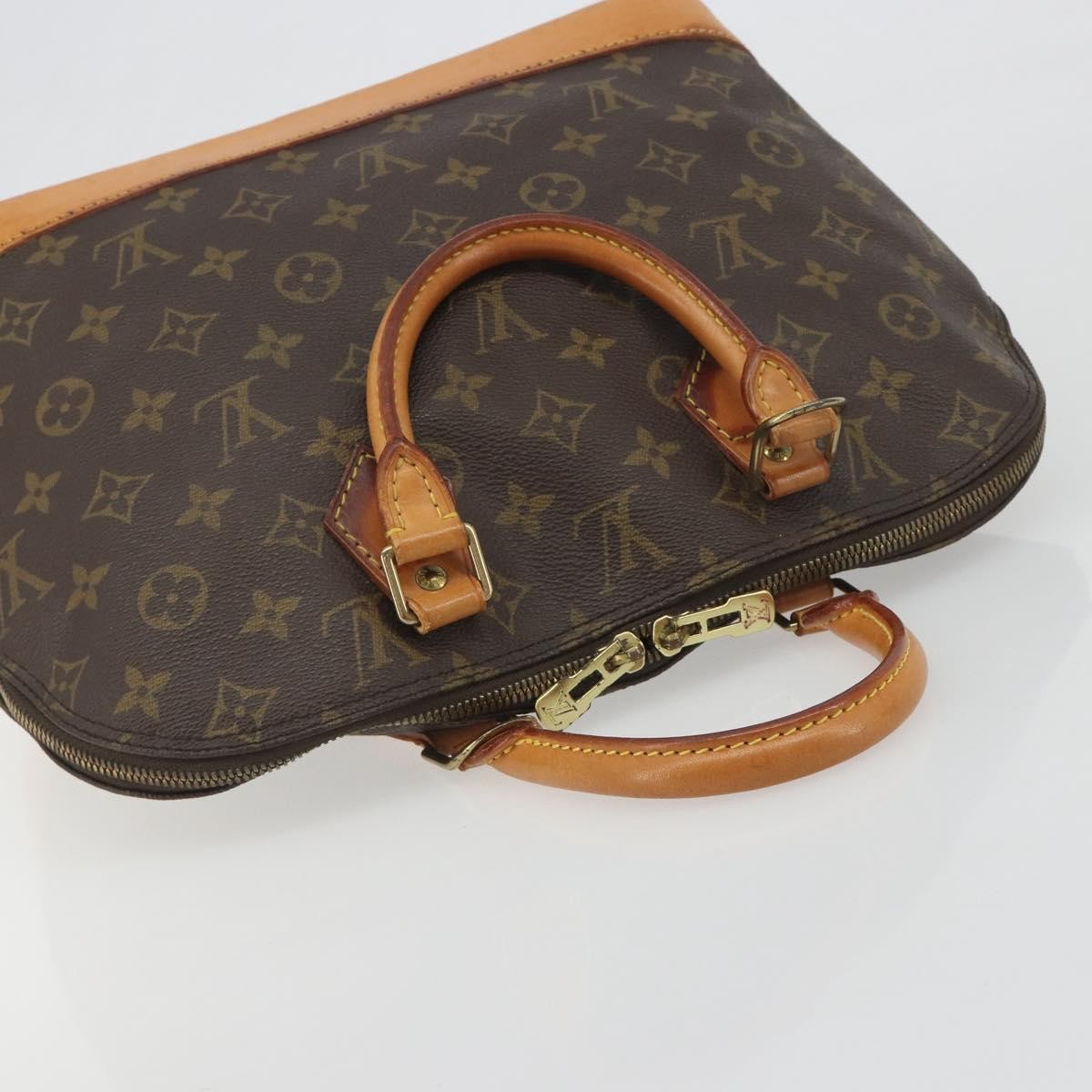 Louis Vuitton Alma Monogram Brown Canvas Handbag (Pre-Owned)